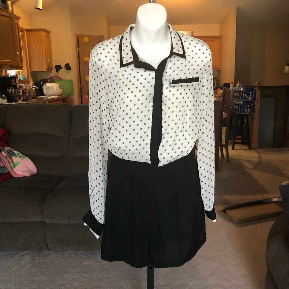 Cream and black romper. Used
